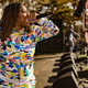 Kamaiyah wears a Bathing Ape Multi Camo sweat shirt ($428) and sweatpants ($273) / Image via Getty